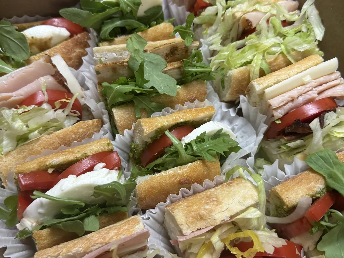 Piknik sandwiches boxed for an office lunch